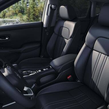 2027 Honda HR-V EX-L  interior showing the black leather-trimmed front seats and center console (Subcompact Crossover SUV).