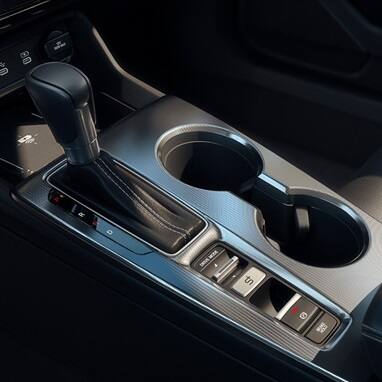 2027 Honda Civic Hatchback Sport Touring Hybrid center console with gear shift and cup holders (Compact Hatchback).